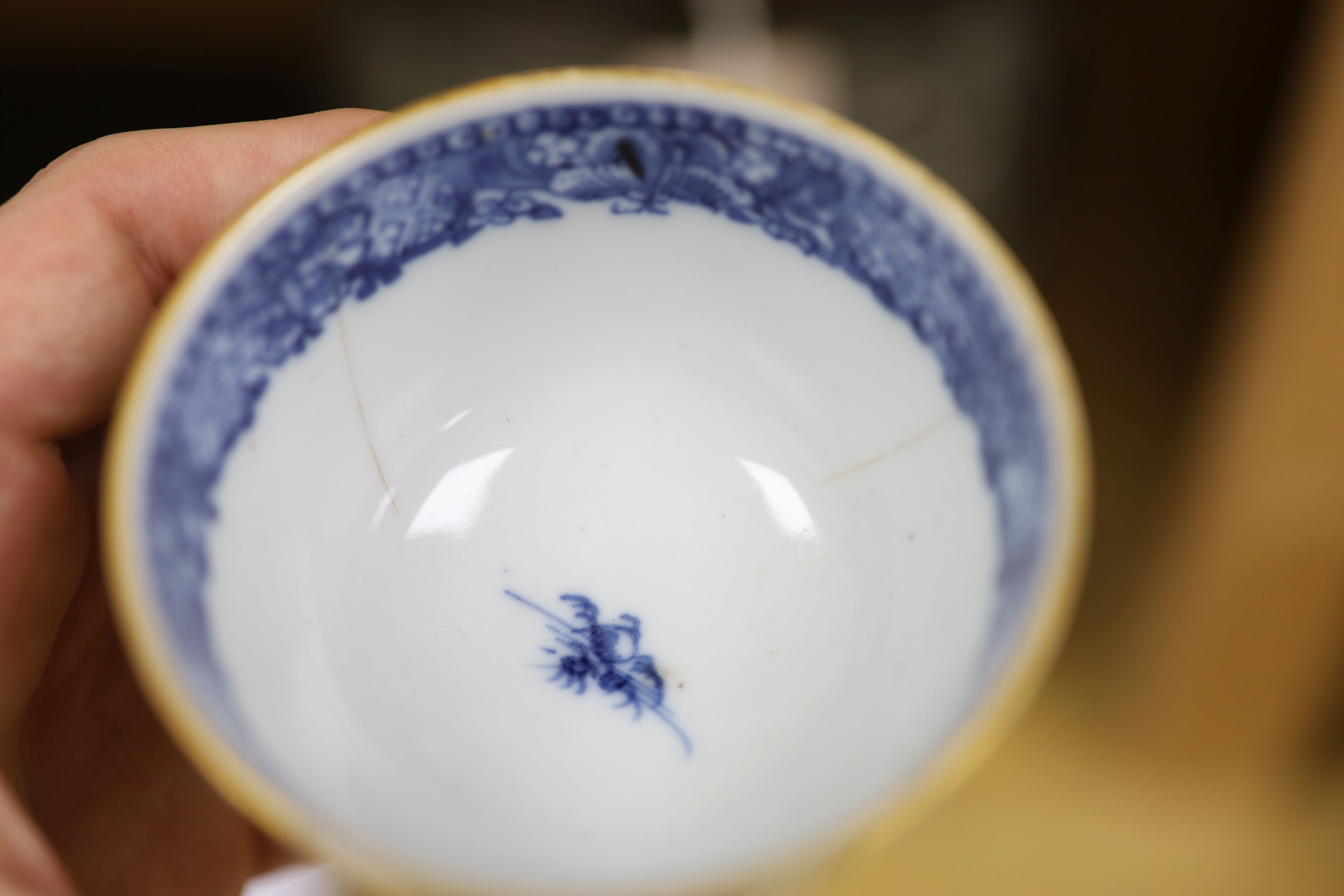 A Chinese blue and white bowl, diameter 15cm, a tea bowl and saucer, a crackleglaze shell dish and a celadon glazed stem cup